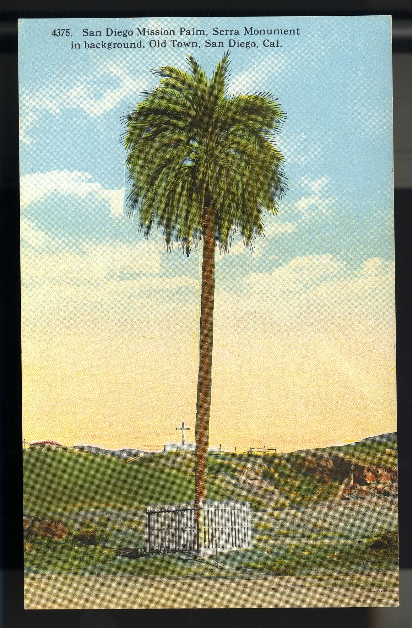 California Mission Colored Postcards 4 | California Missions Postcard 03 – San Diego Mission Palm, Serra Monument in background, Old Town, San Diego, Cal. H. L. Christiance Company. ca 1915. NMAH 1986.0639.0672.
